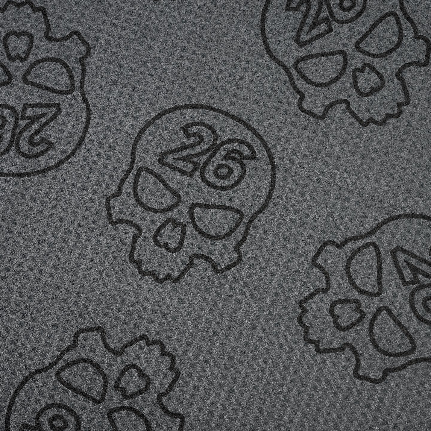 PXG dark gray darkness repeat player's golf towel with repeating skulls on a white background