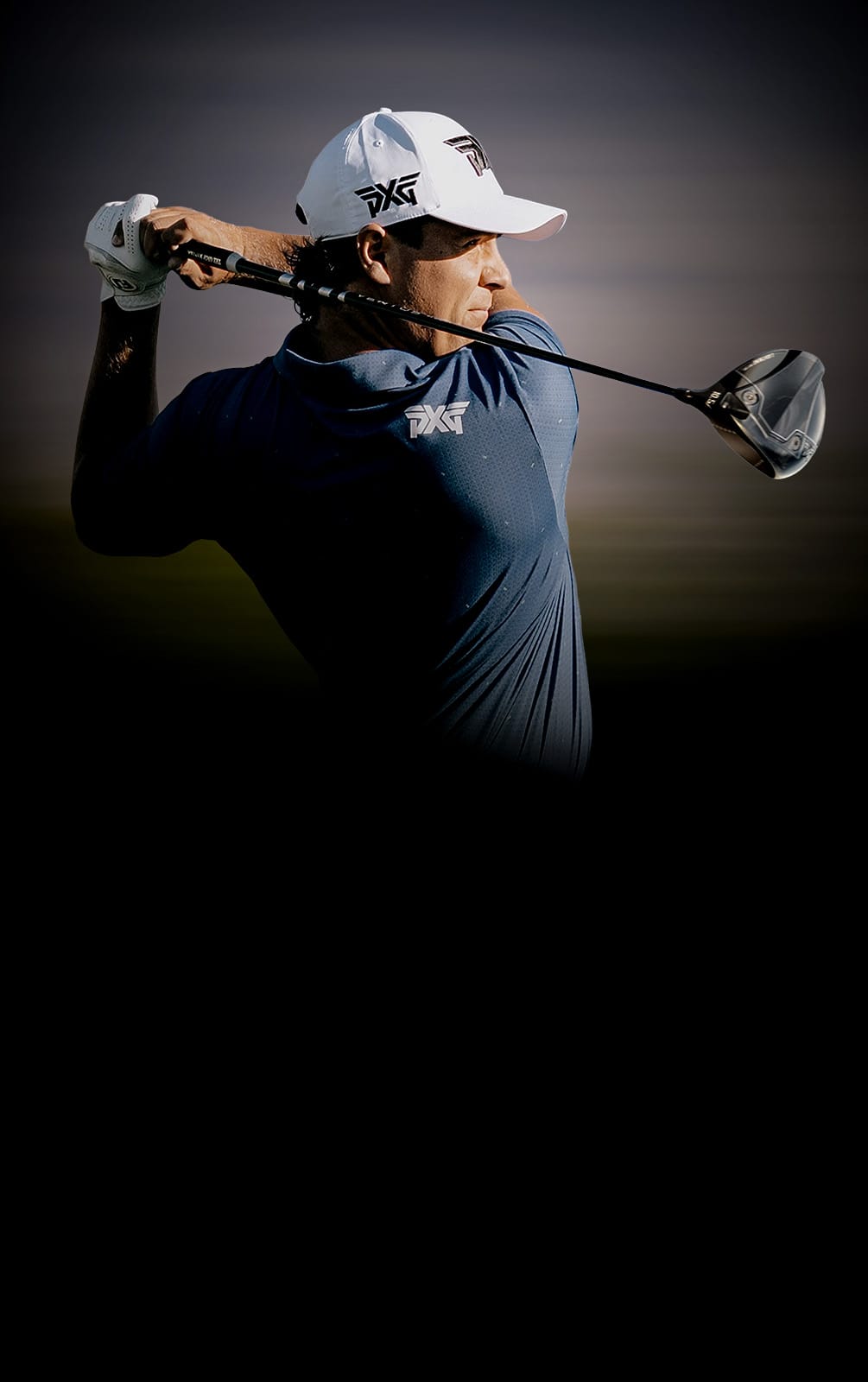 Pro Golfer swinging a driver with motion blur