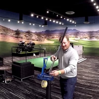 Man with loft and lie machine