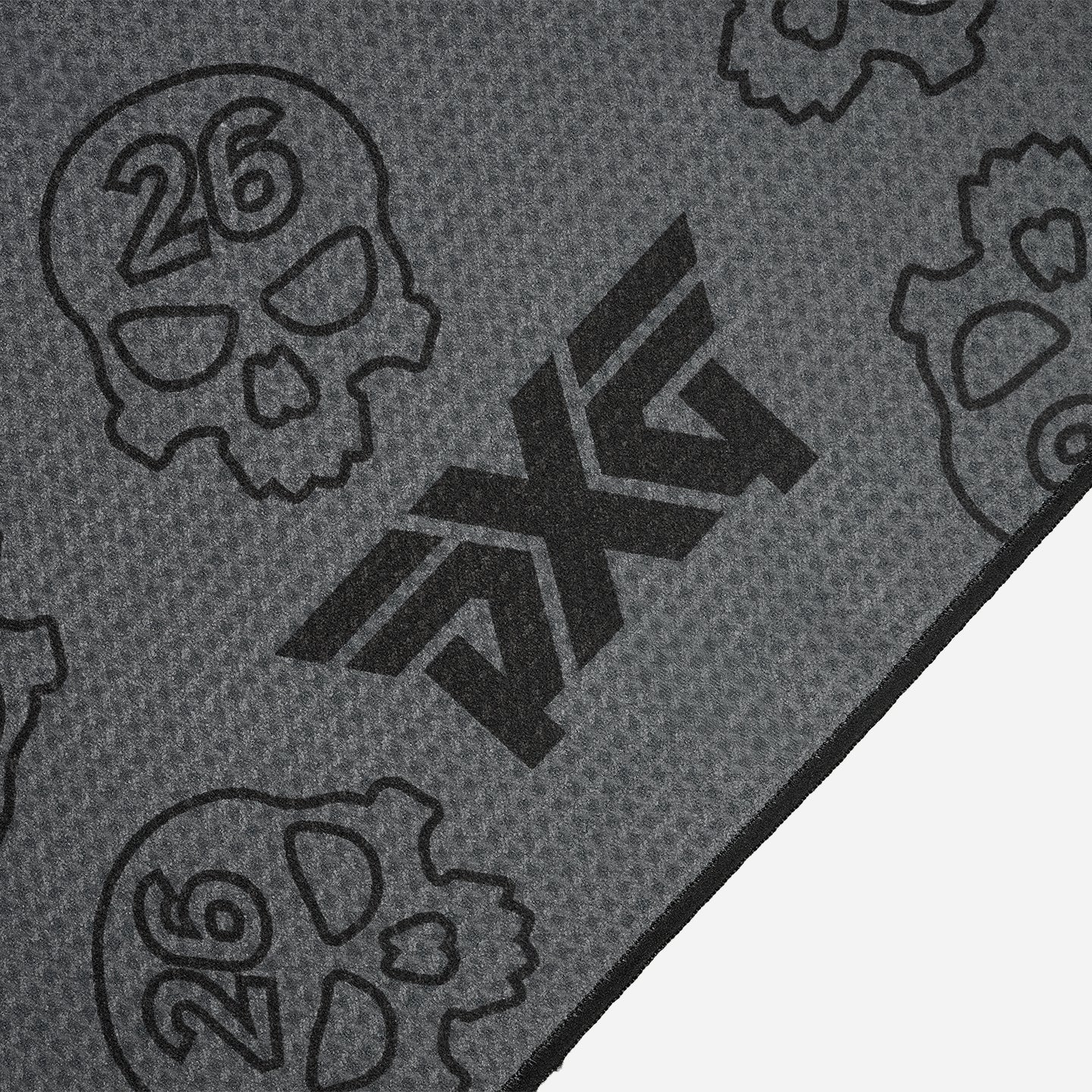 PXG dark gray darkness repeat player's golf towel with repeating skulls on a white background