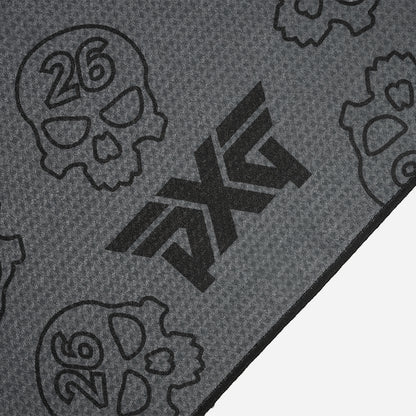 PXG dark gray darkness repeat player's golf towel with repeating skulls on a white background