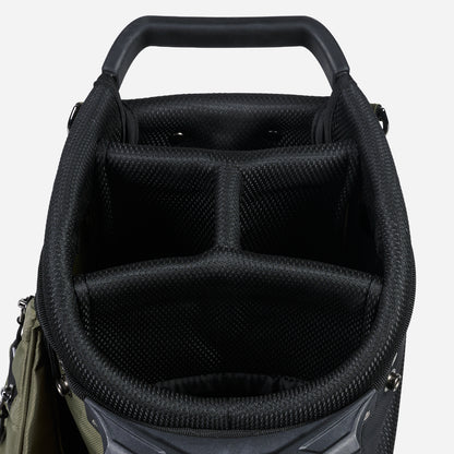 Close-up of a black golf bag with compartments on a white background
