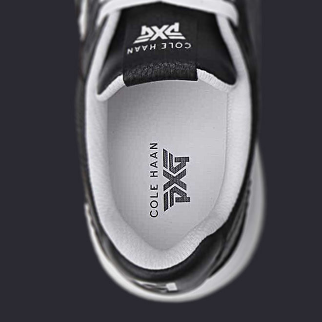 Close-up of Cole Haan PXG sneaker sole with brand logo.