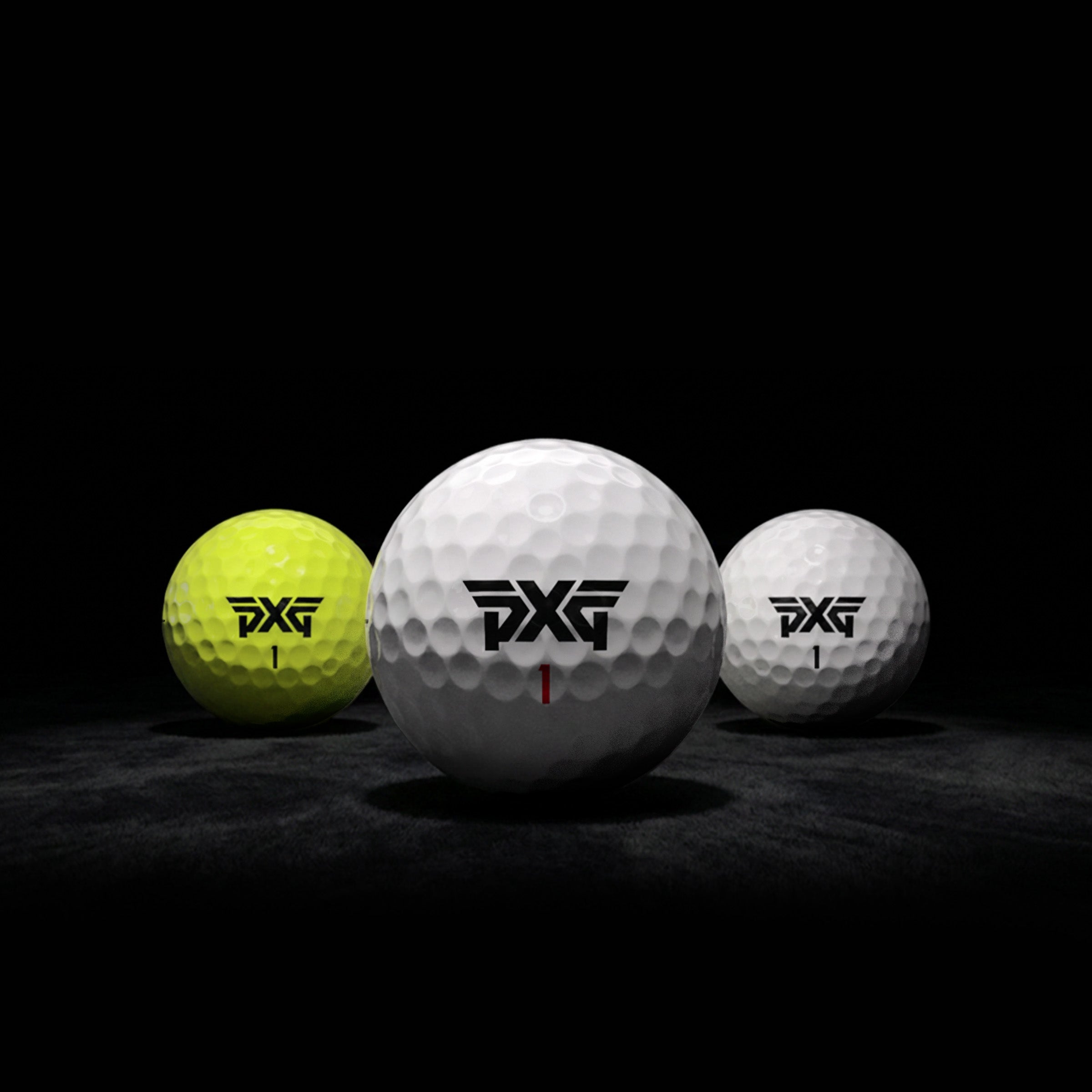 3 different golf balls