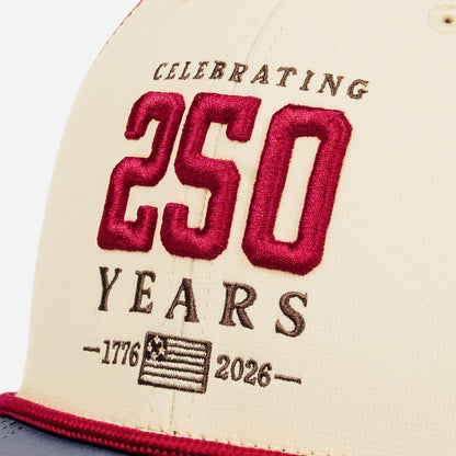 Vintage beige cap with a red 250 on a white background