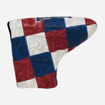 Blade putter headcover with patchwork colors of blue, white, and red on a white background