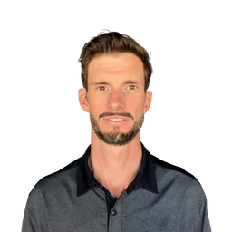 A man with short brown hair and a trimmed beard wearing a dark gray heathered polo shirt with a black collar, shown against a plain white background.