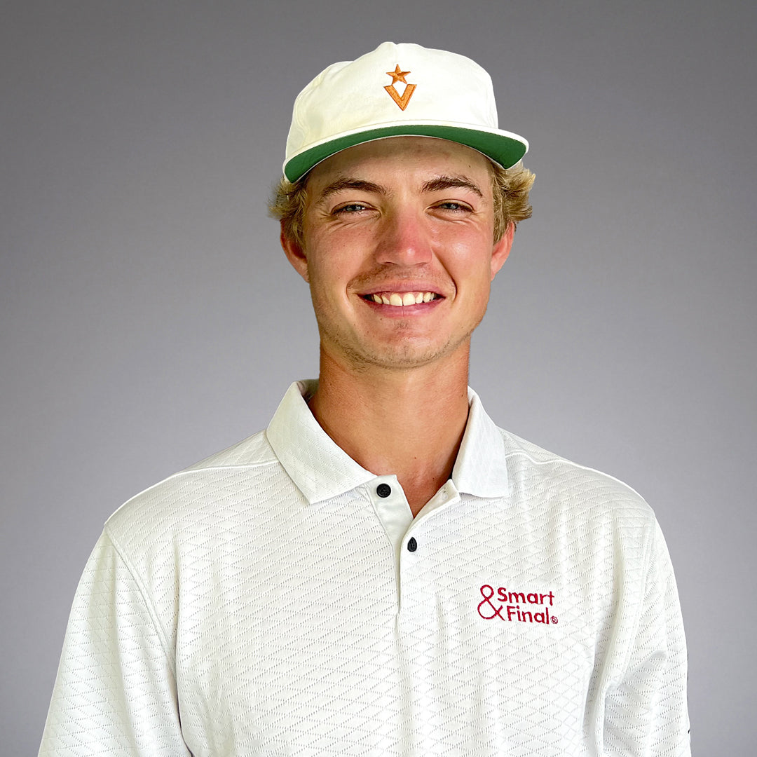 Tour Pro Nathan Petronzio smiling with a gray background.