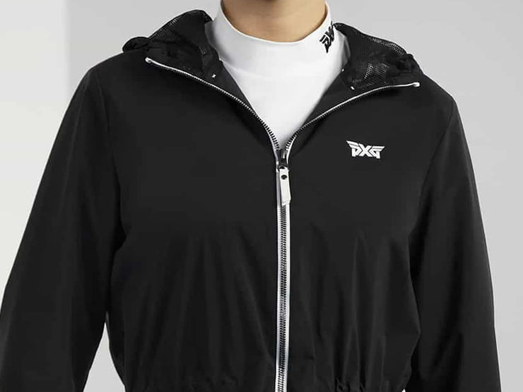 A black hooded windbreaker jacket with a white PXG logo on the left chest, worn over a white mock neck collar, shown against a light gray background.