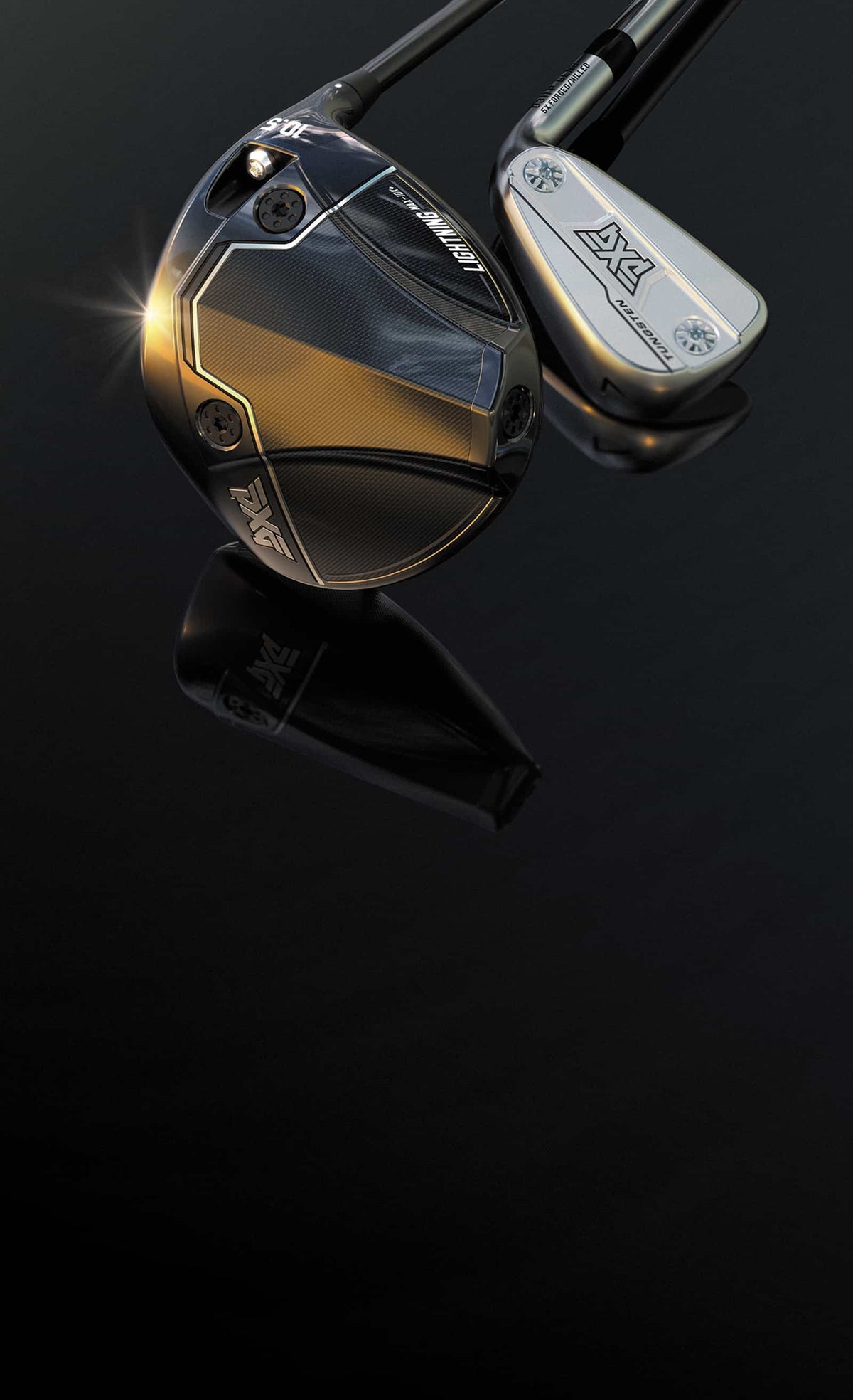 A close-up studio shot of two golf clubs on a glossy black reflective surface. The larger club in front is black with metallic gold and silver geometric detailing, and the smaller club behind it is silver with black branding.