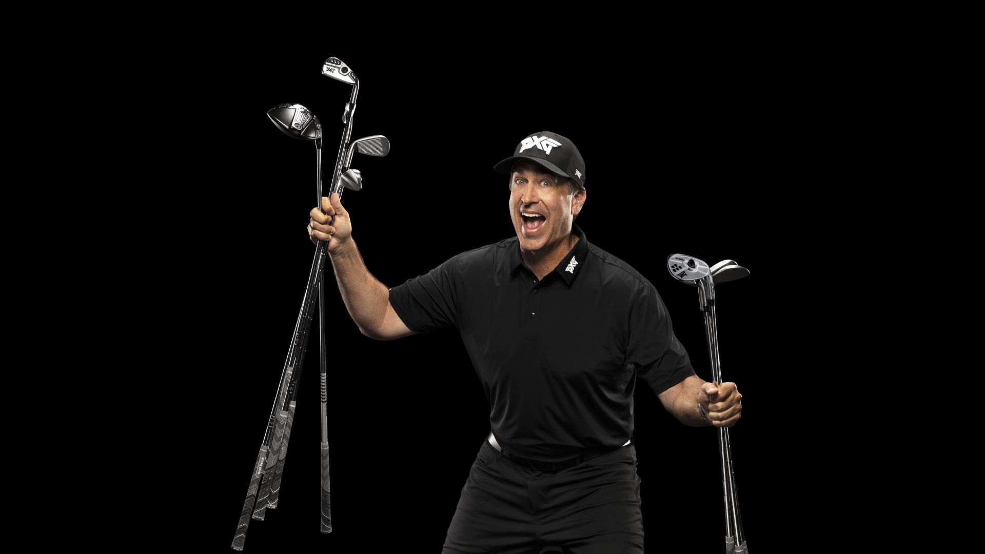Rob riggle holding many golf clubs
