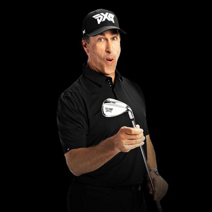 Rob Riggle Holding Wedge