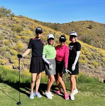 Renee Parsons on golf course with friends