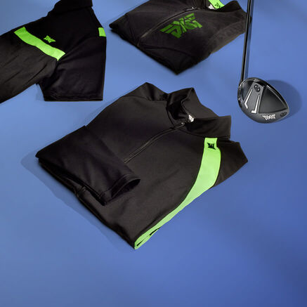 Green and black clothing and golf club