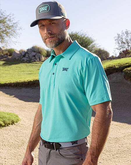 man in pxg polo and pxg hat