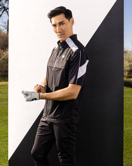 man in pxg polo and pxg trousers